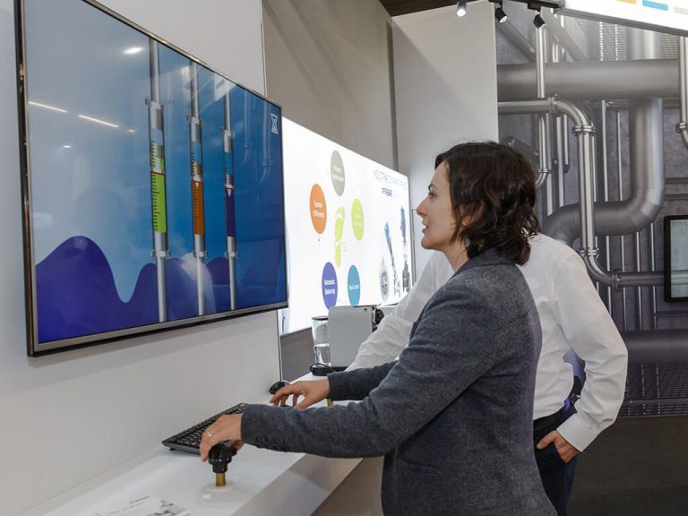 Phygital engagement in use on exhibition stand